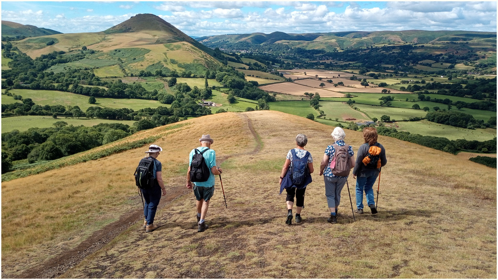 Group walking over the hills
